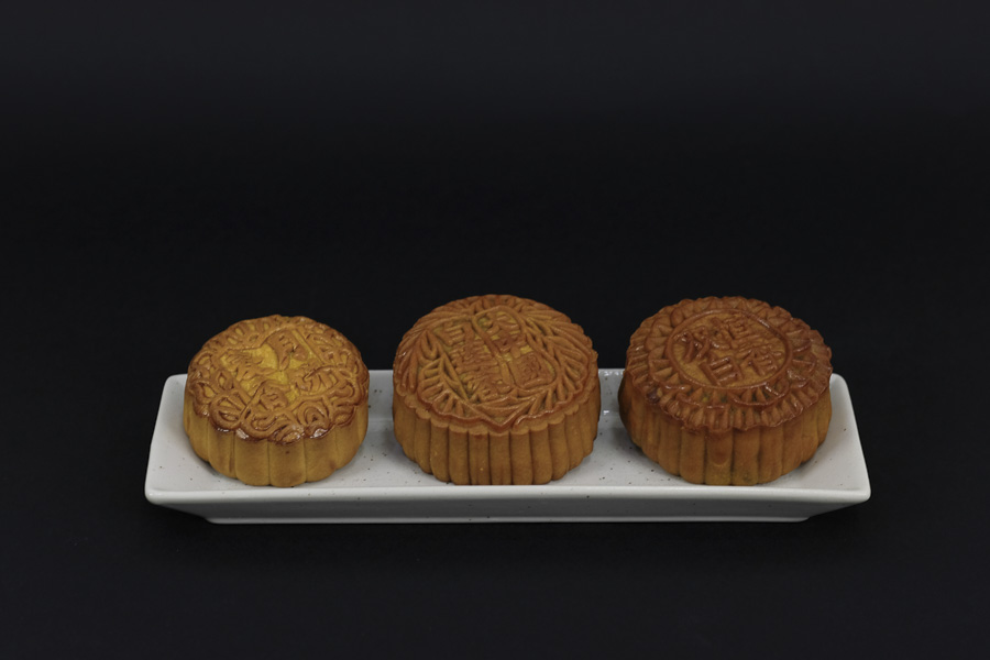Traditional Mooncakes - From Left to Right: Mooncakes from the Supermarket, Tai Chong Kok Mooncake, Hang Heung Mooncake