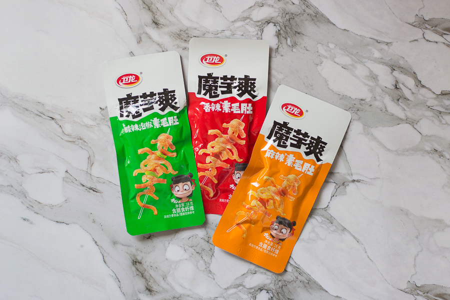 Green Red and Orange packagings for the Weilong Spicy Konjac Snack to differentiate spice levels