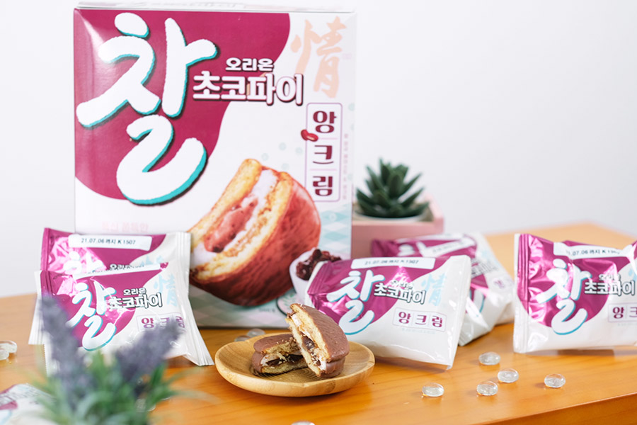 Cross Section of Red Bean Choco Pie from Korea on a plate with the box packaging in the background