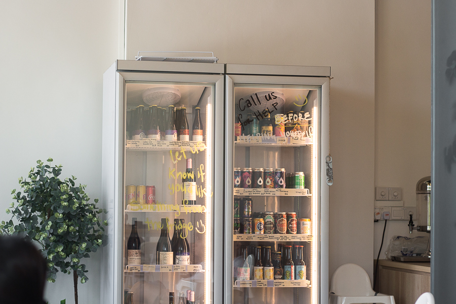 fridge filled with various craft beers