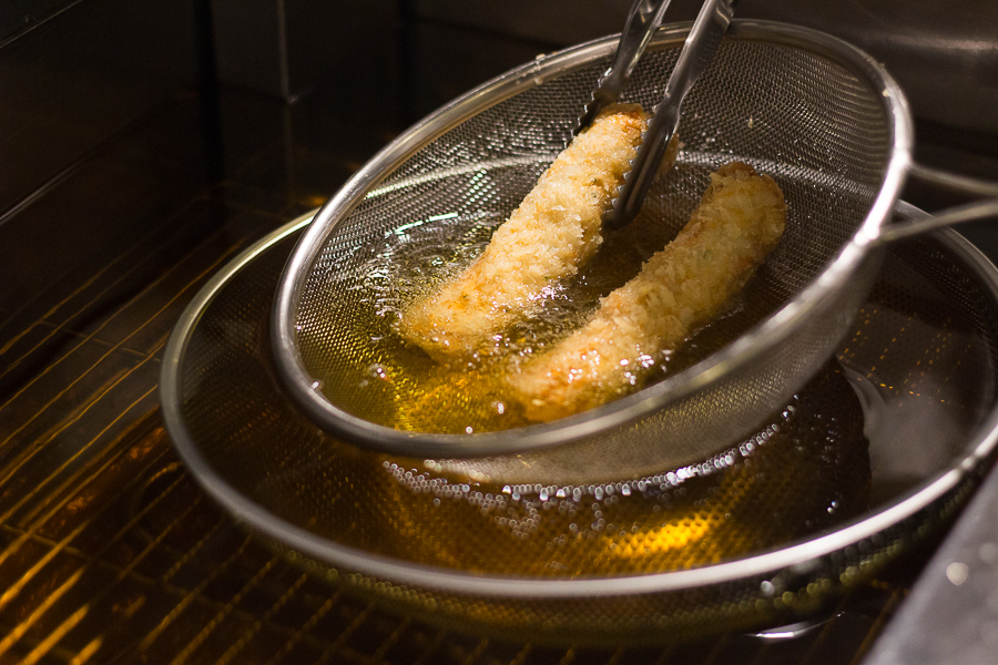 Deep frying fishcakes in oil