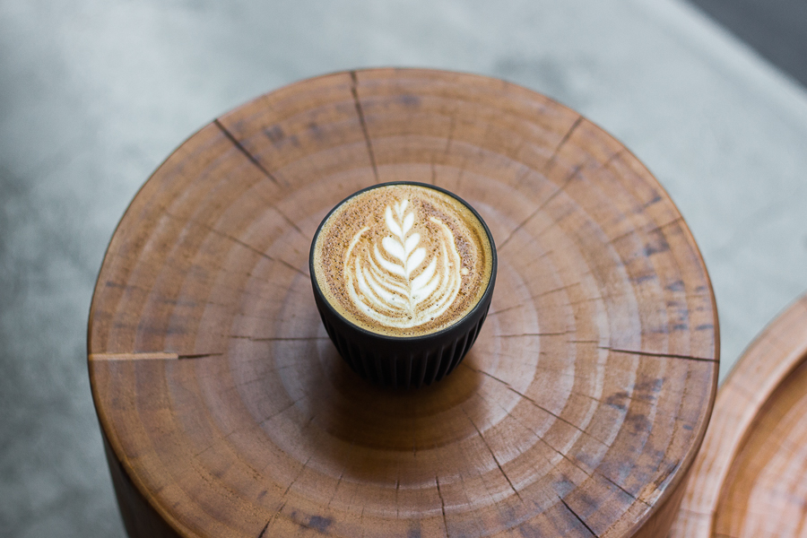A cup of flat white with latte art