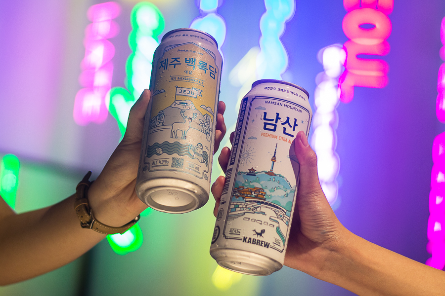 2 cans of Korean craft beers, left: Jeju Baengnokdam Ale, Right: Namsan Mountain Beer
