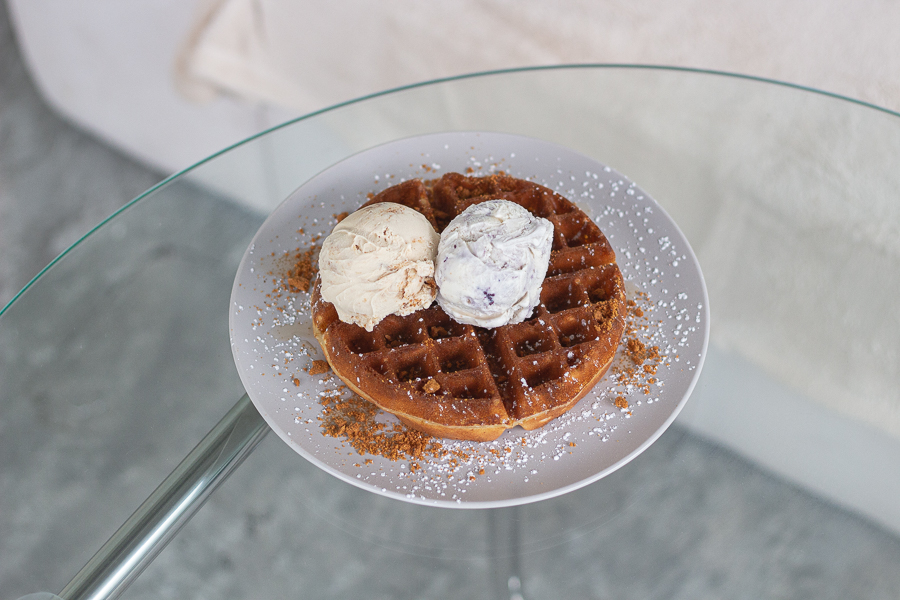 Waffle with a scoop of PBJ ice cream and a scoop of Speculoos Ice Cream