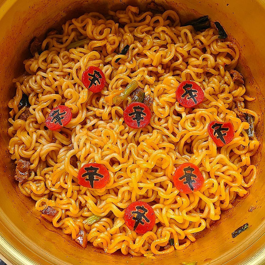 Fish Cakes in Nongshim's Latest Stir-Fried Shin Ramyun with a '辛' design on them