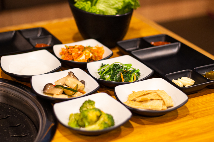 Wonderful Bapsang IMM's side dishes such as Korean fishcakes, brocolli, kimchi and mushrooms