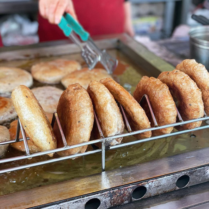 freshly fried hotteok on display