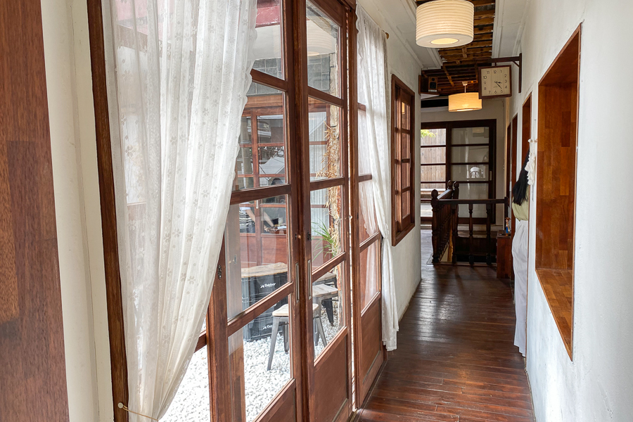A corridor located within Woody Zip (우디집), a cafe in Seoul