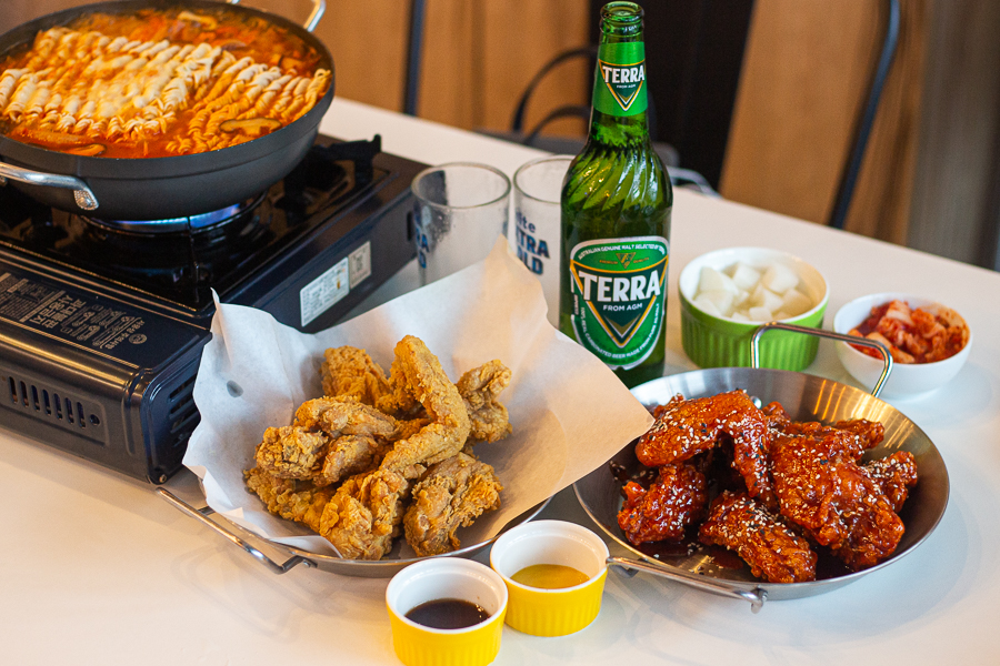 88 Chicken Korean Fried Chicken in Original and Yangnyeom, with a bottle of Terra beer and a pot of Army Stew