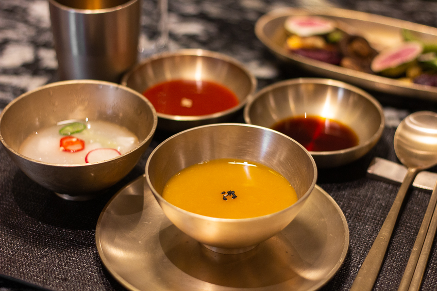 Pumpkin Porridge and Dongchimi served in Korean Bronzeware