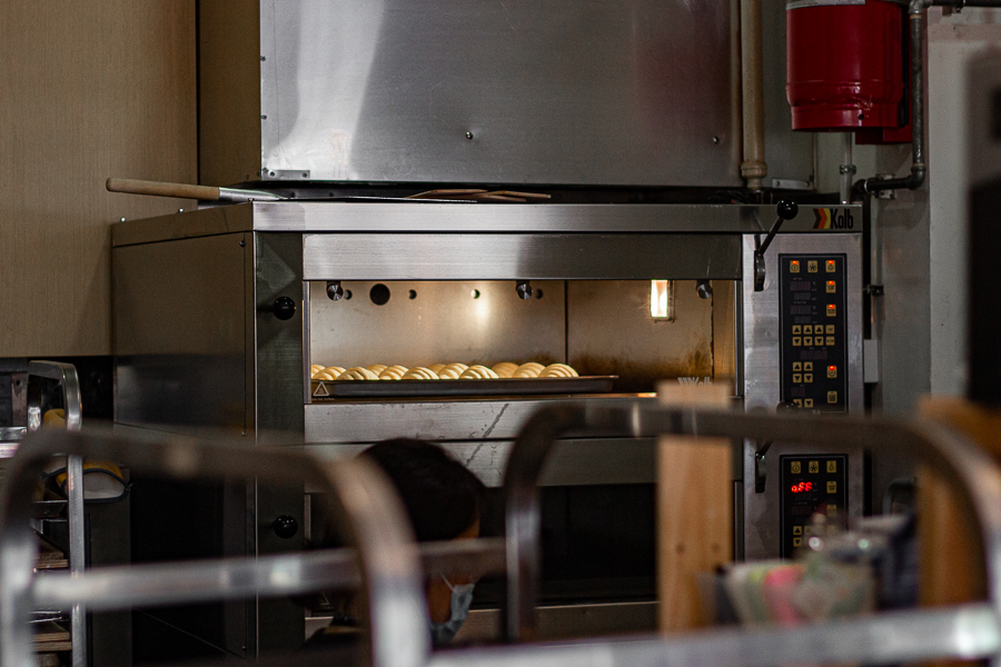 A tray of croissants baking in the oven