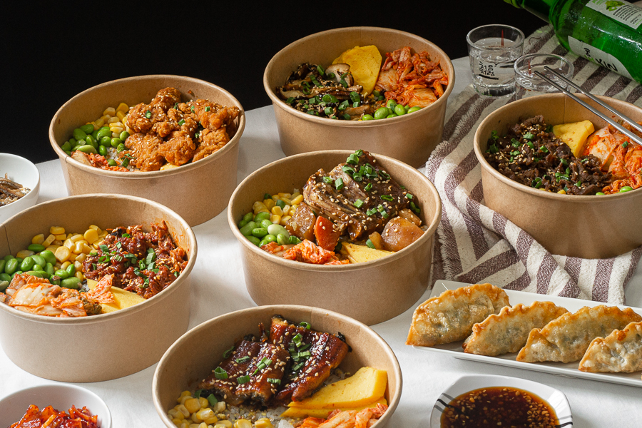 A table with different rice bowls from Bap Bap Korean Rice Bowls