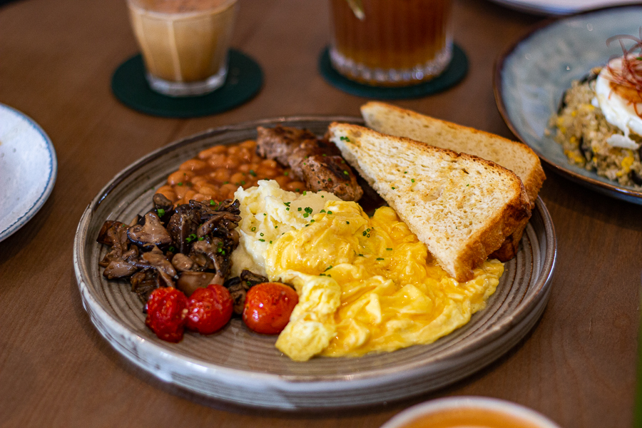 Big Breakfast from Oaks Coffee Co. with scrambled eggs, toast, cherry tomatoes, mushrooms and more
