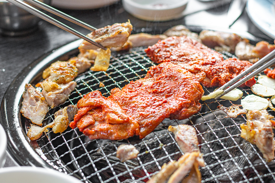 Grilling Yangnyeom Dakgalbi over Charcoal