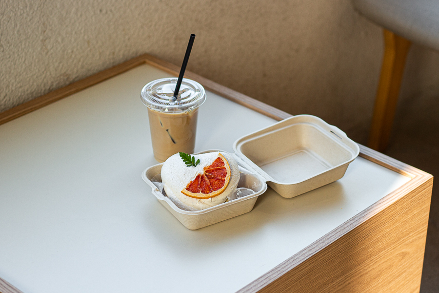 A cup of cold brew latte and earl grey chiffon cake