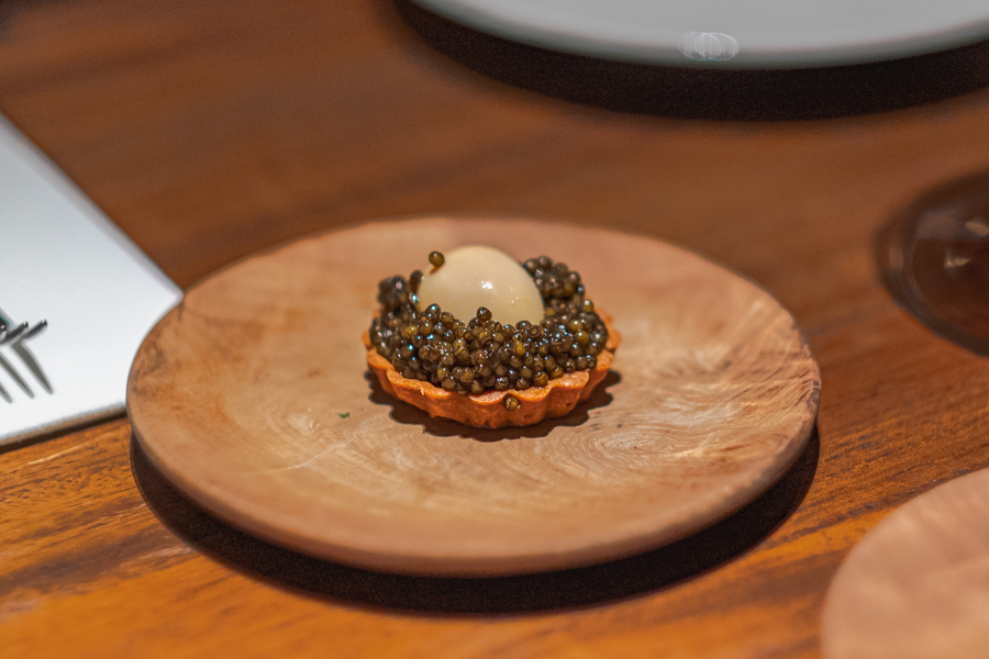 Egg Tart with Caviar and Quail Egg from Burnt Ends