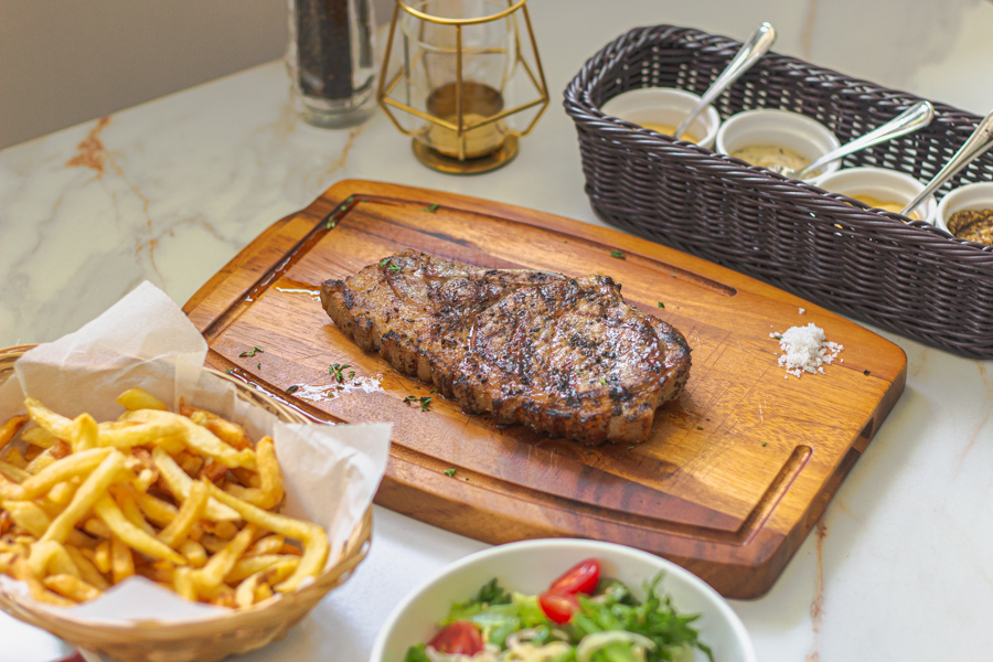 Grilled Canadian Pork Chop 400g with fries, salad and sauces