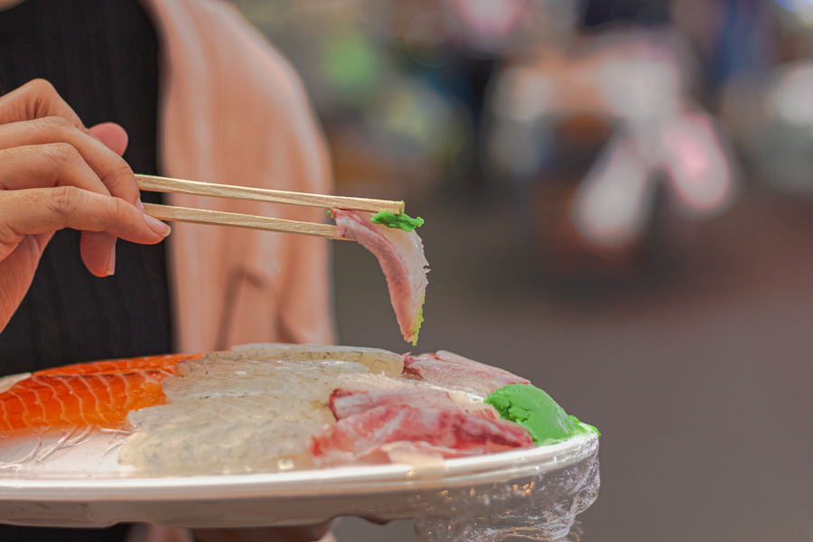 Fresh Sashimi dipped with Wasabi atMokpo Dongbu Market
