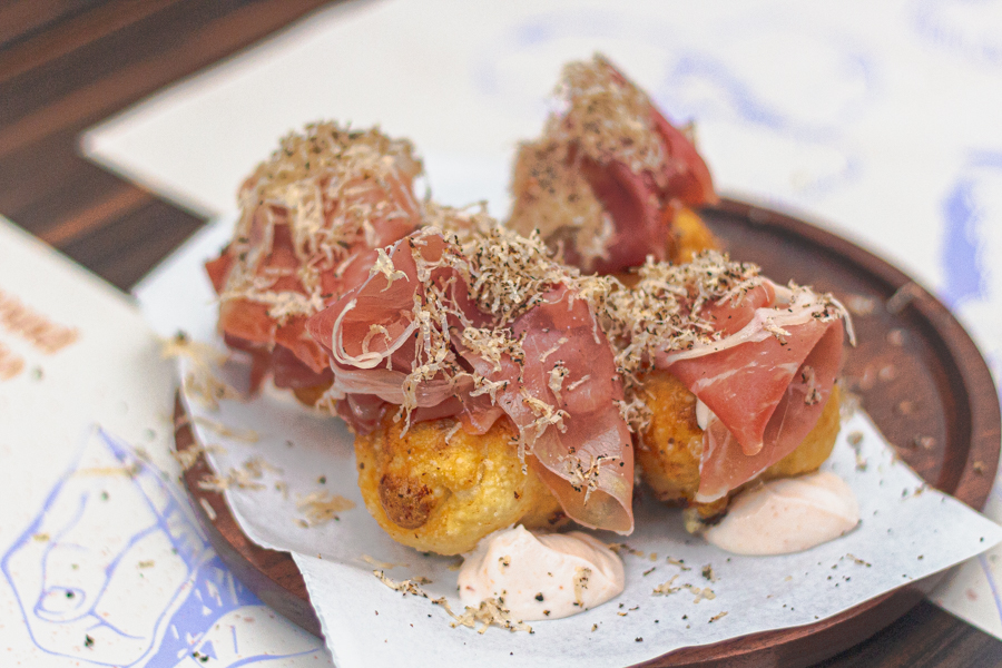 Hand-rolled Potato pies stuffed with scamorza, topped with prosciutto and truffle