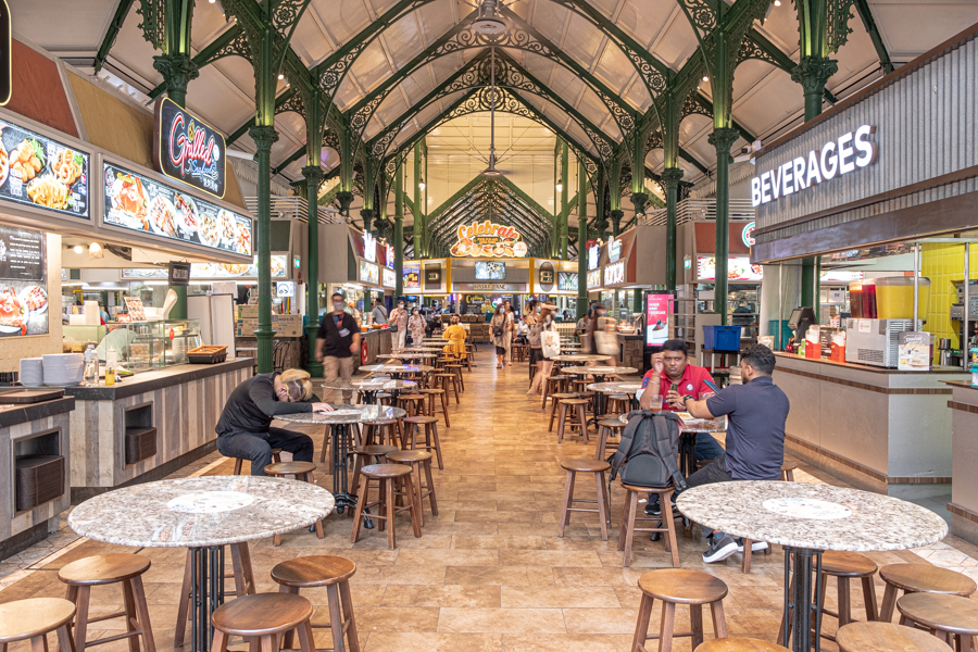 The interior seating of Lau Pa Sat hawker center in Raffles Place, Singapore
