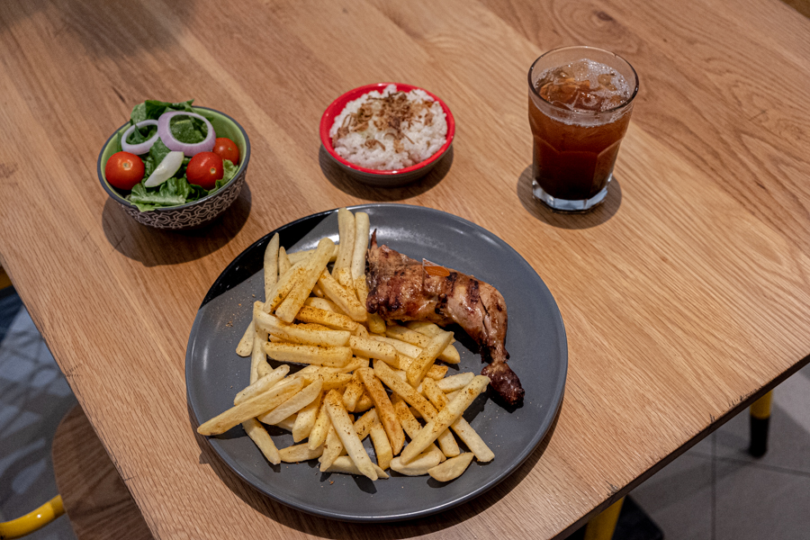 The 1/4 flame-grilled chicken from Nandos with fries, Signature Rice and a Side Salad