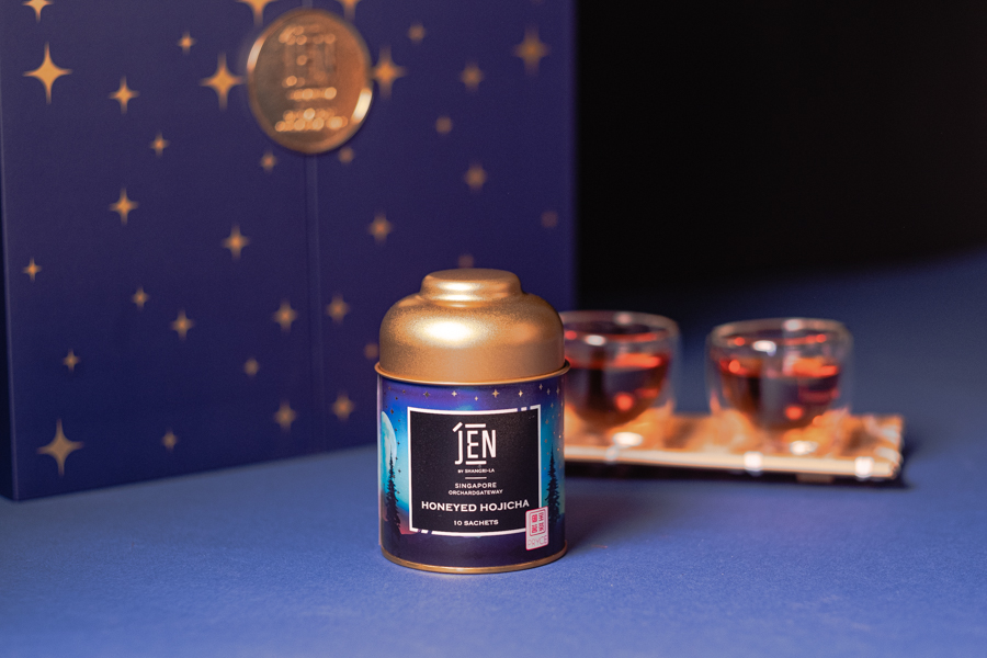 A tea cannister of Honeyed Hojicha Tea by Pryce Tea for Hotel JEN's galaxy mooncake gift set