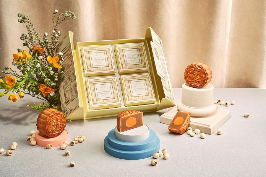 Traditional baked mooncakes by Raffles Hotel Singapore with white lotus and salted egg yolk