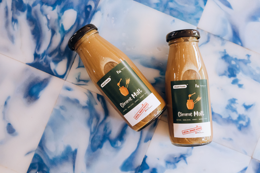 Two bottles of Gimme Malt Coffee by Foreword Coffee Roasters and WhatIF Foods, made with bamnut milk