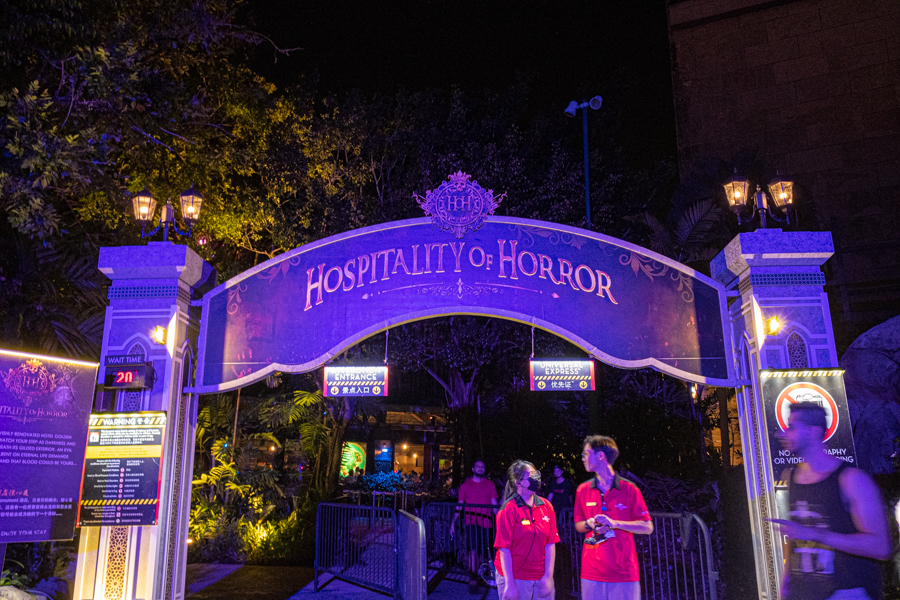 The entry sign for Hospitality of Horror, a hotel-themed haunted house