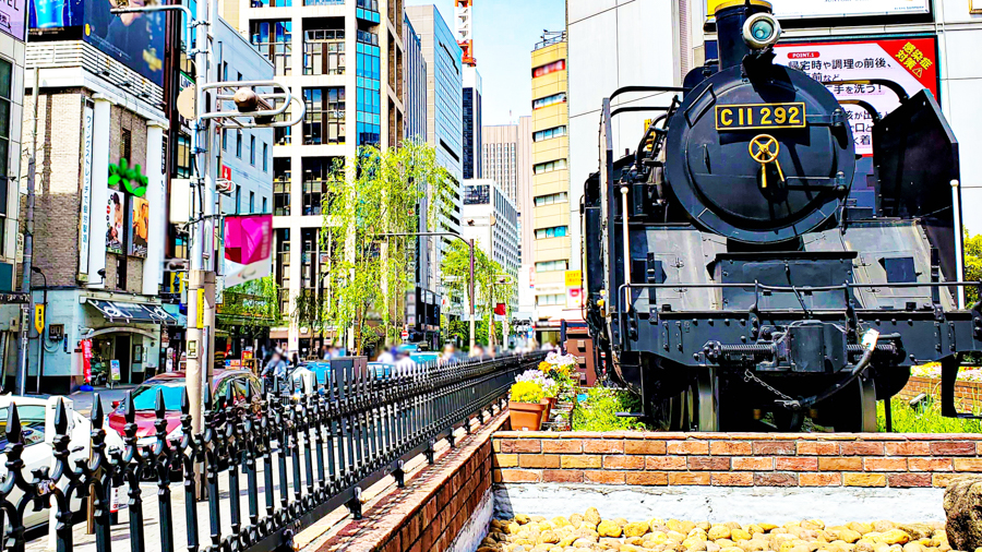 An exterior shot of a Japanese railway station