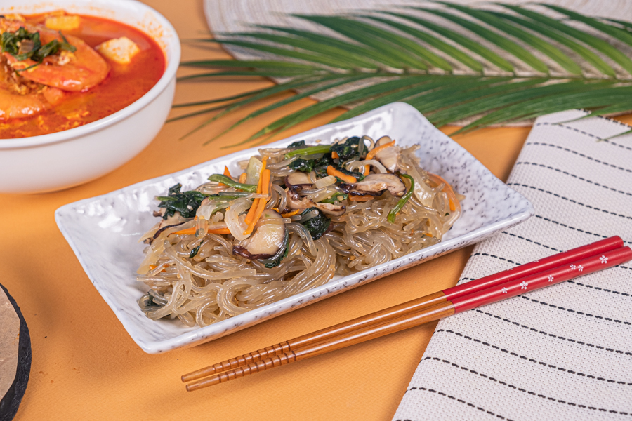A serving of Japchae or Korean stir-fried glass noodles