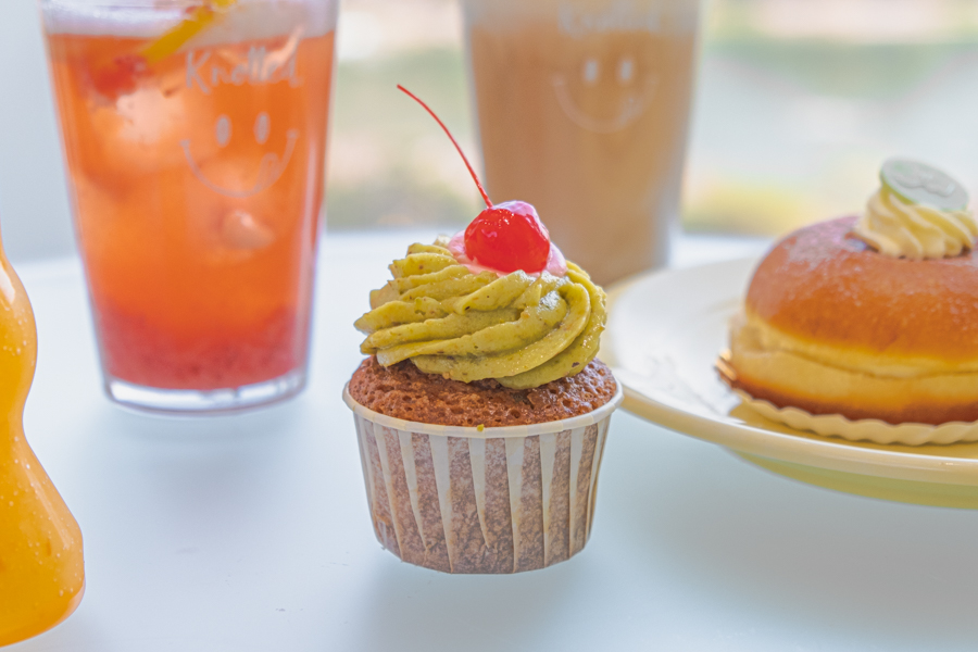 Knotted Cherry Pistachio Cupcake