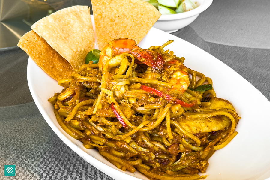 Seafood Paradise Mee Goreng with Ms. Maria. & Mr. Sing’s Masala served with Papadum