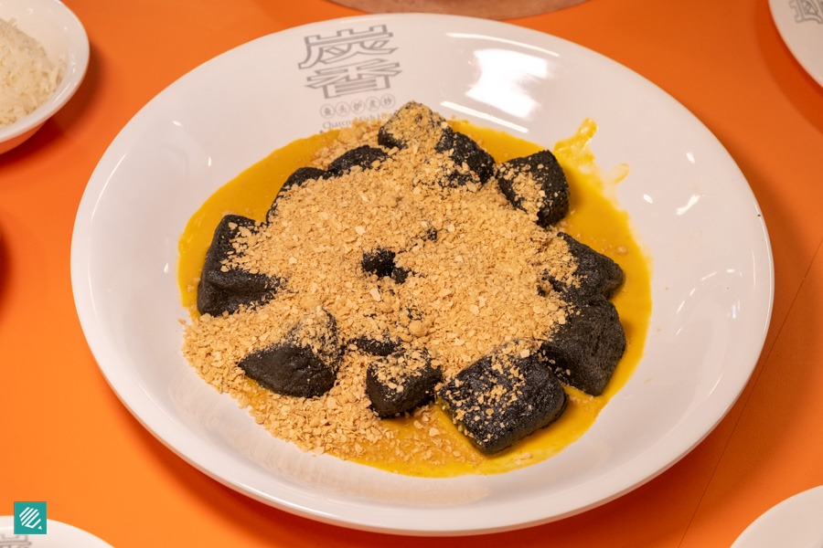 Tan Xiang Cai Shi- Oatmeal Charcoal Tofu with Pumpkin Sauce