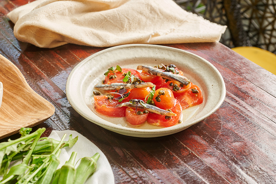 Momotaro Tomatoes topped with Anchovies