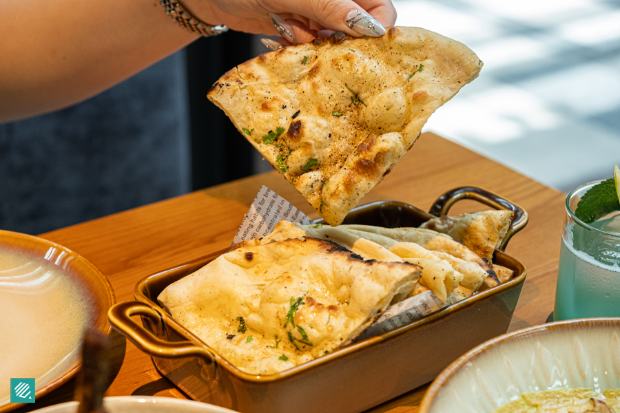 Assorted naan in flavours like garlic, butter, black pepper and truffle