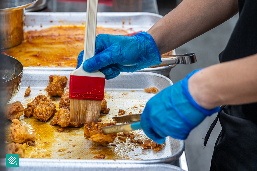 Brushing of Sauce on Fried Chicken