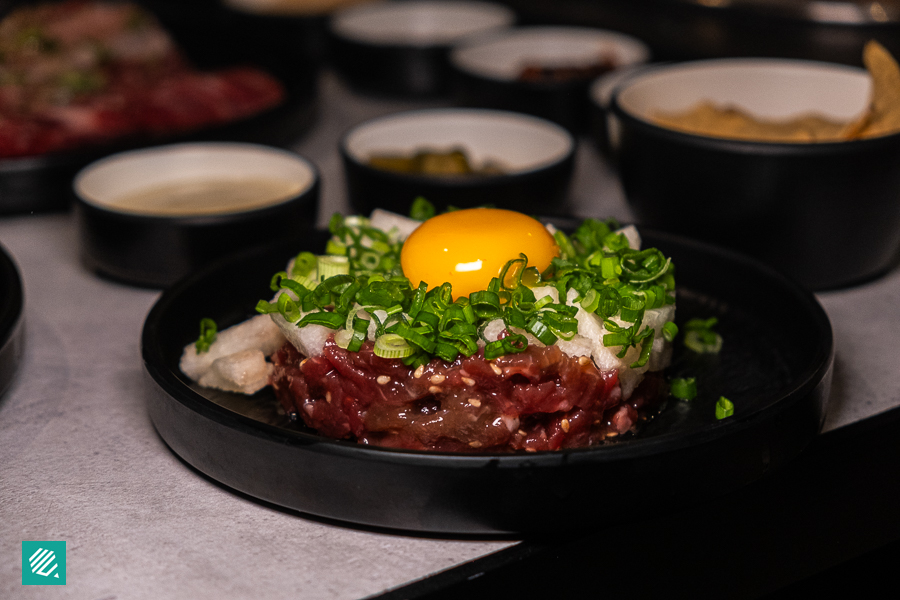 Beef Tartar - Yukhoe topped with Egg Yolk and Green Onions