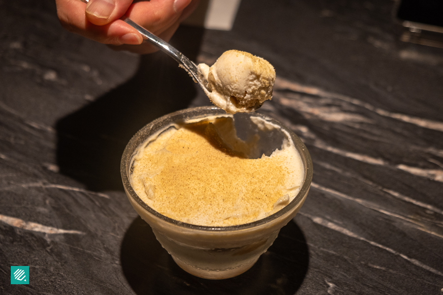 Scooping a spoonful of Cornmisu from Lavi Tapas