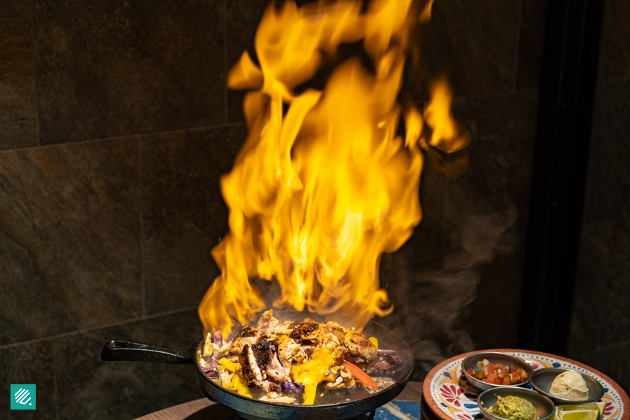 rodeo table chicken fajitas flambed at the table