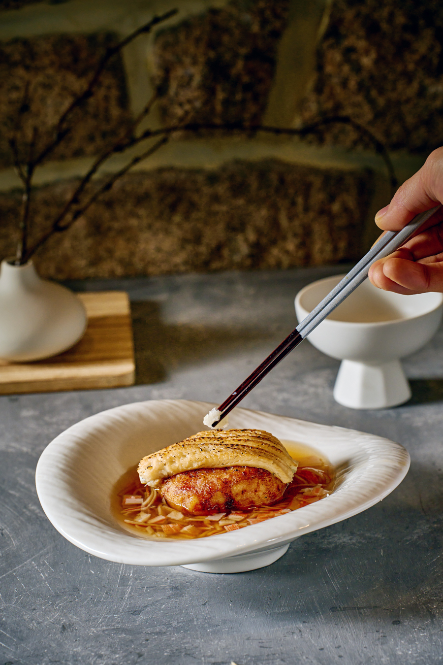 Grilled Sea Eel Renkon Manju with Crab Sauce