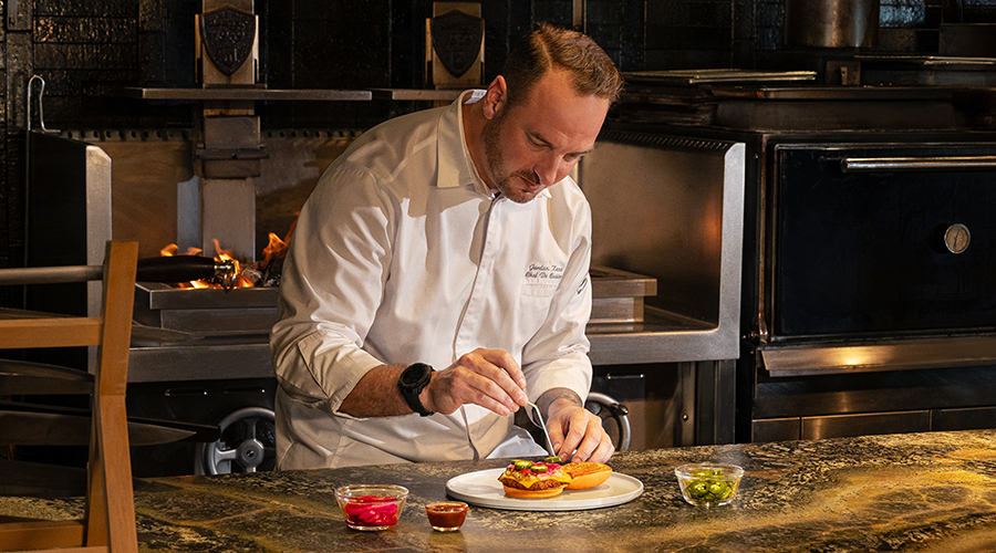Chef Jordan Keao of Butcher's Block Assembling a Burger