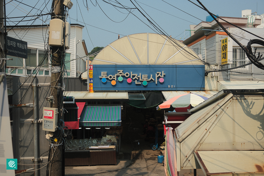 Colorful market entrance with awning
